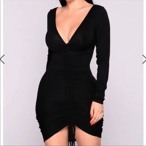 Black ruched black dress from fashion nova